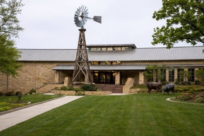 Illustrative exterior view of the Doss Heritage and Culture Center in Weatherford, Texas, showing building layout, landscaping, and pedestrian access