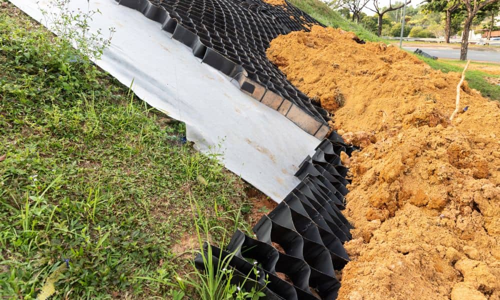 Geocell armoring used to stabilize a disturbed embankment and meet erosion control requirements